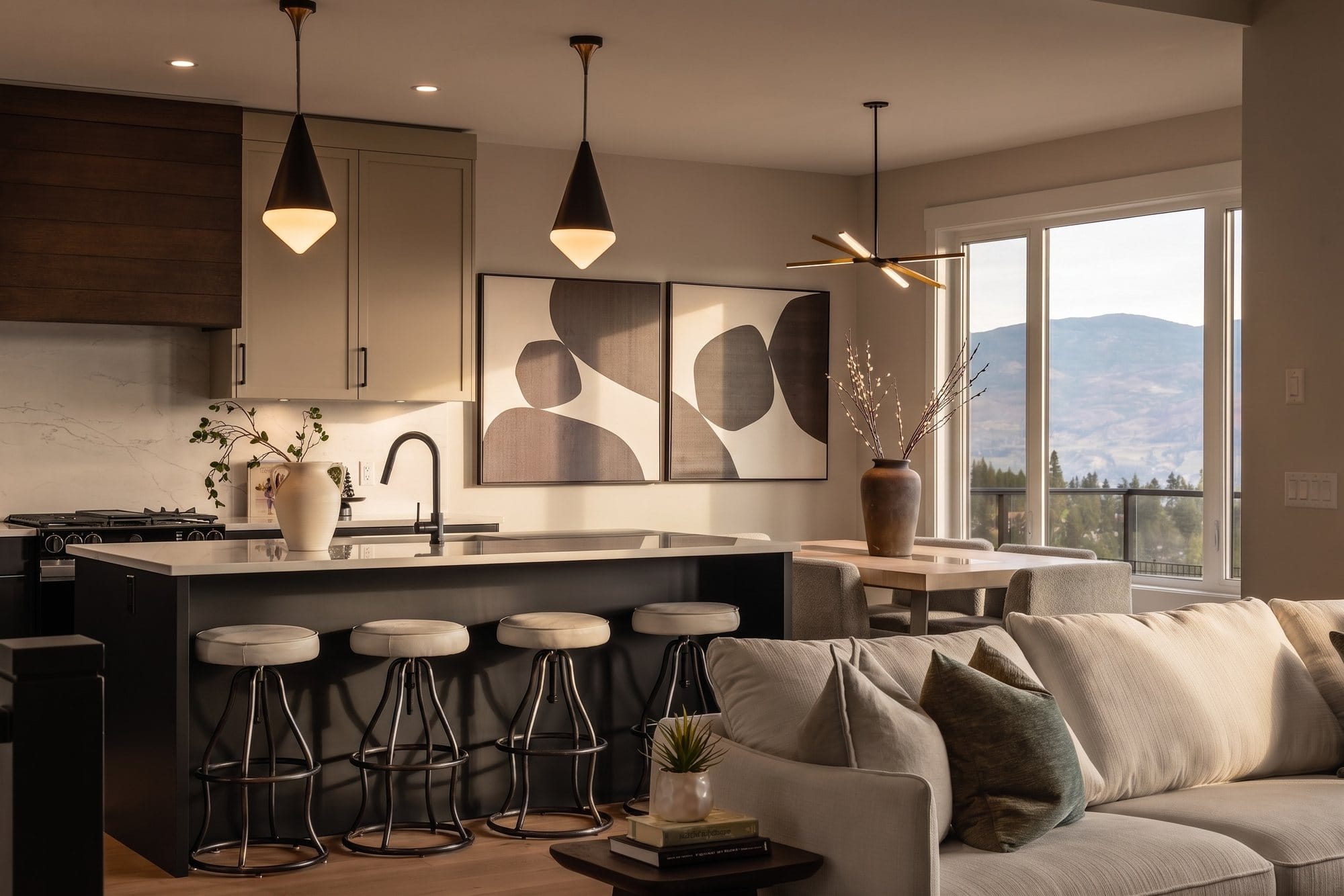 Kitchen island and living room at 2531 Pinnacle Ridge Drive in Tallus Ridge, mountains out the dining windows